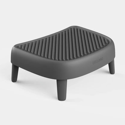 Grey plastic textured cat litter trap step and ramp with four legs.