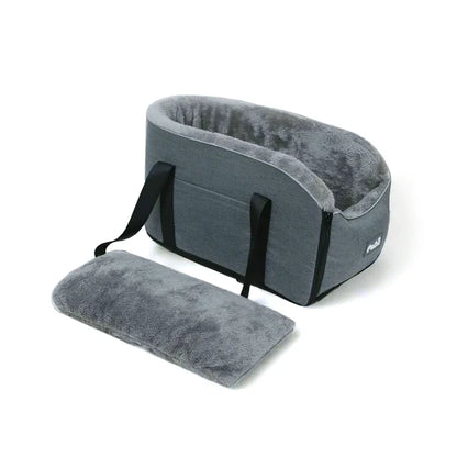 Grey fabric pet car booster seat with soft fleece interior and a removable plush cushion.