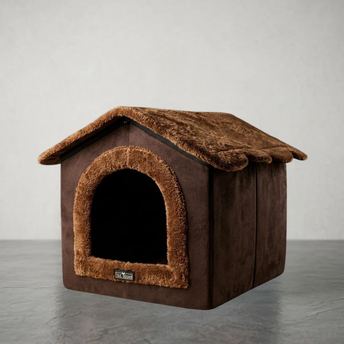 Brown plush indoor dog house and enclosed cat cave with fleece roof.