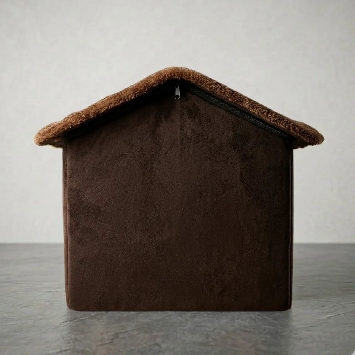 Back view of brown plush indoor dog house showing the roofline zipper assembly.