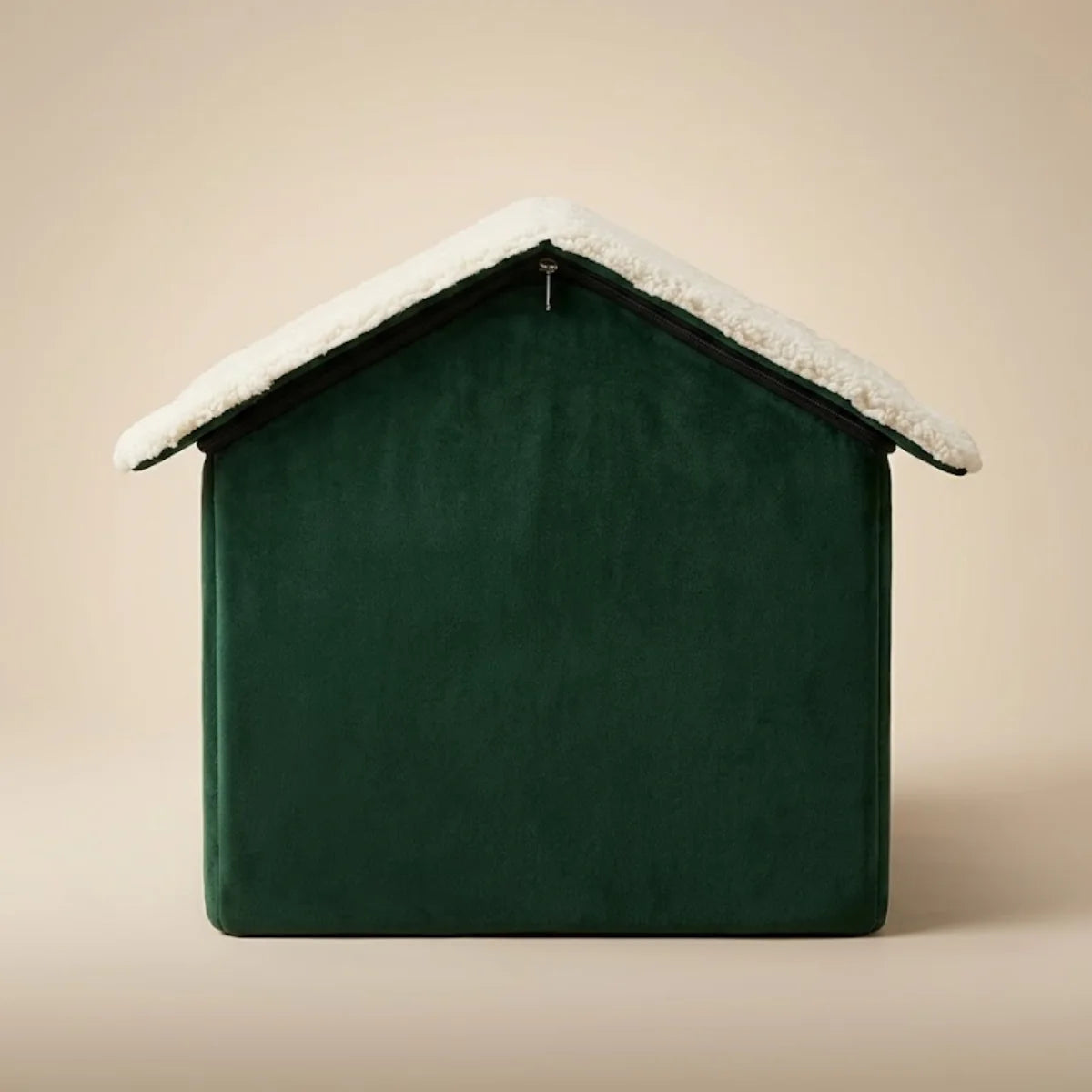 Back view of green and white plush dog house showing roof zipper assembly.